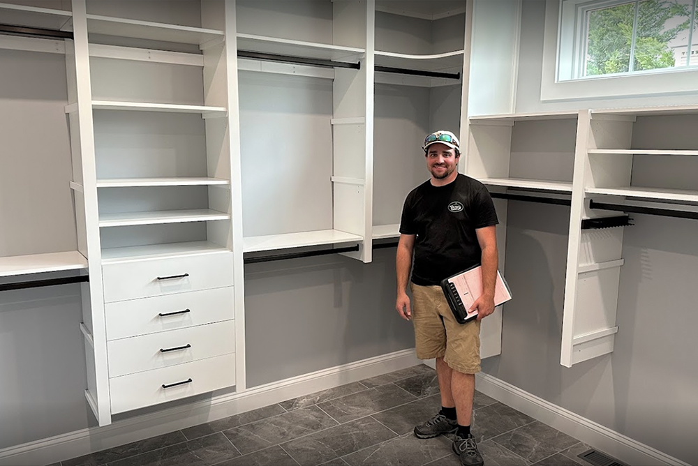 Victory Closets Installer standing in Closet