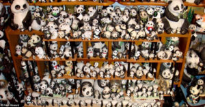 a packed closet full of stuffed pandas