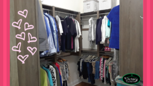 clothes hanging in custom walk in closet