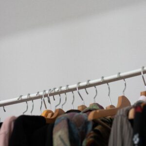 clothes hanging on a rod