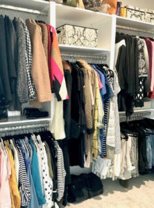 colorful wardrobe hanging in closet