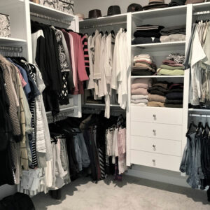 organized woman's walk-in closet