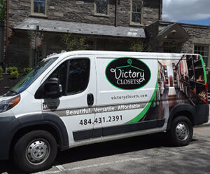 Victory Closets van parked in front of house