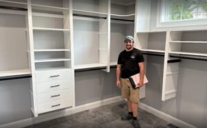 Image of Victory Closets installer standing in closet